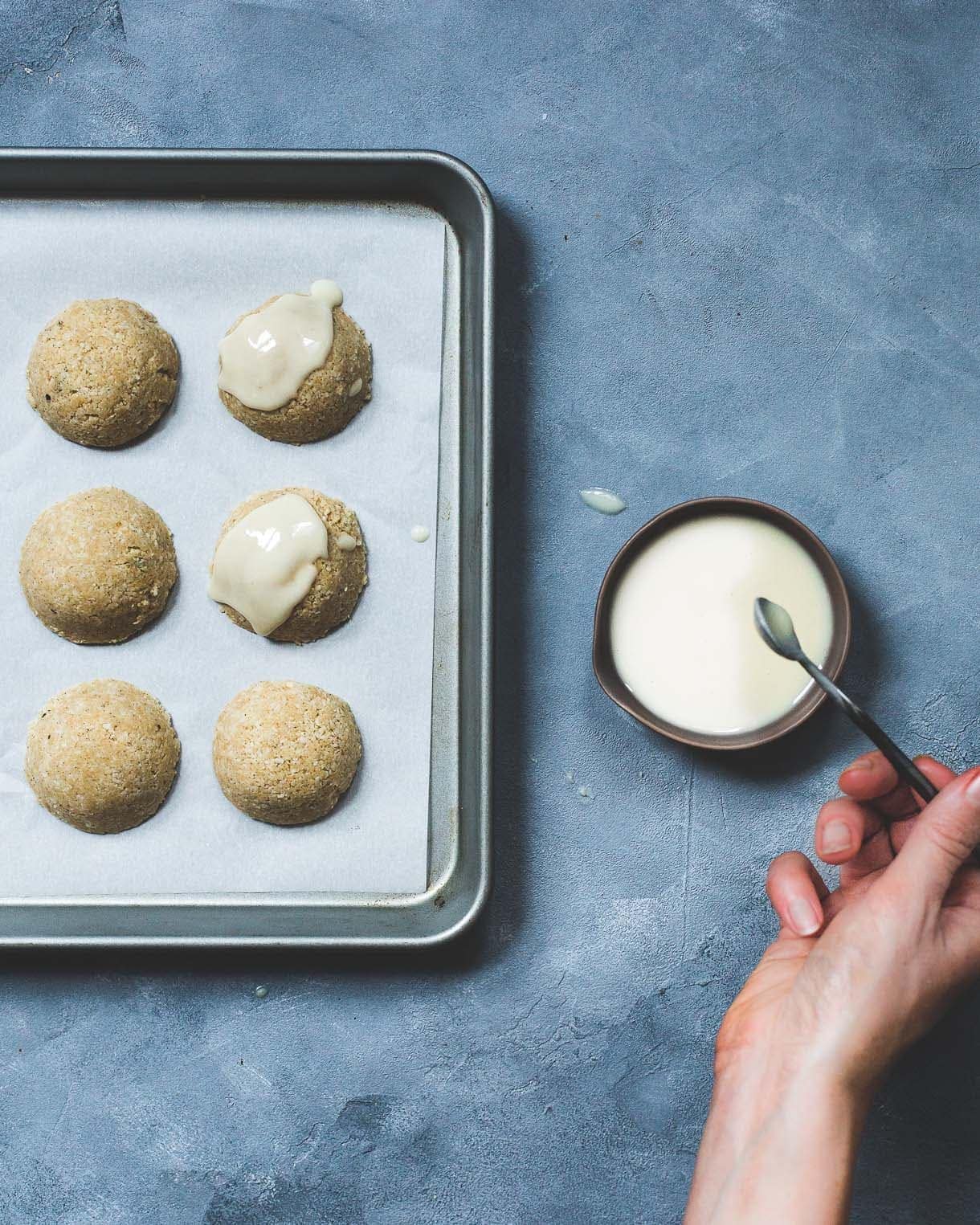 No-Bake Coconut Macaroon Snowcaps {gluten-free}, drizzled with coconut butter.