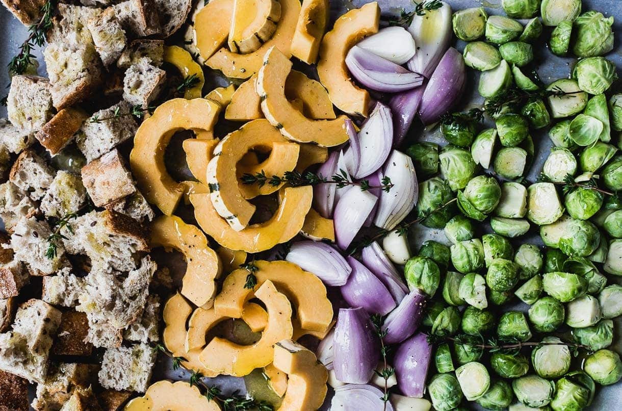 Vegetarian Sheet Pan Stuffing with squash, brussels sprouts, and shallots