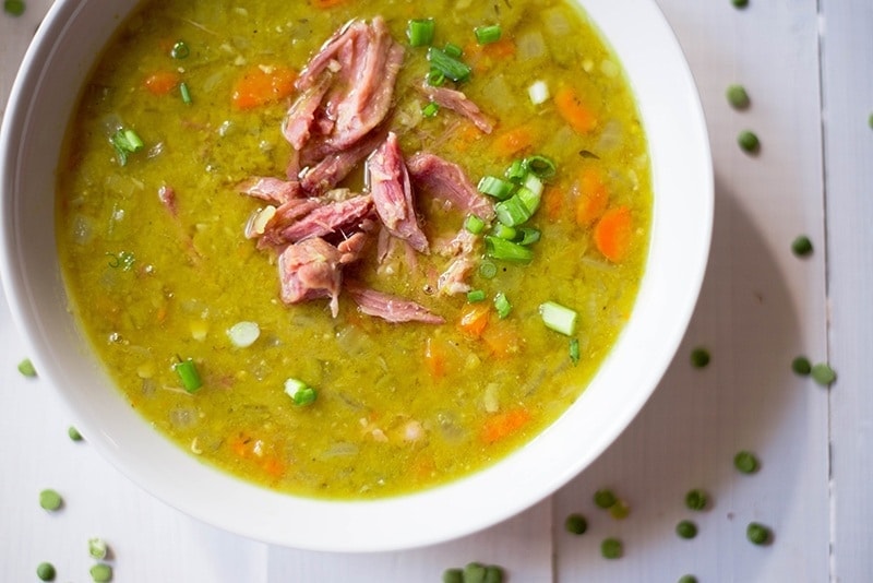 split pea soup in white bowl