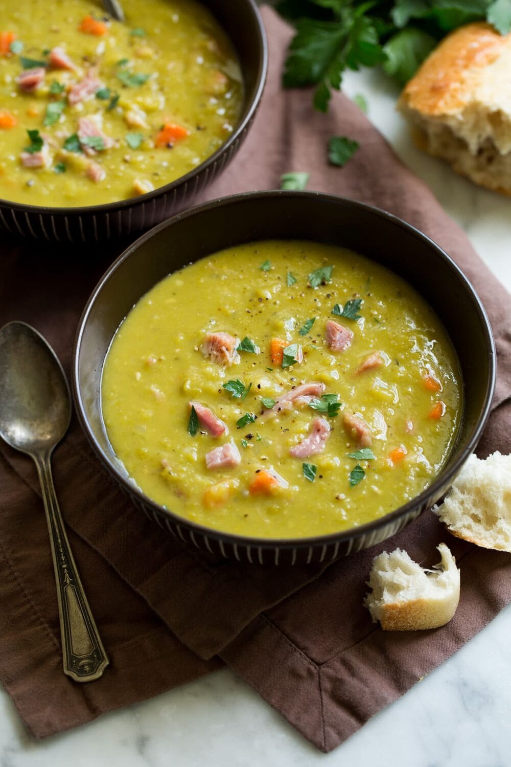 split pea soup in black bowls