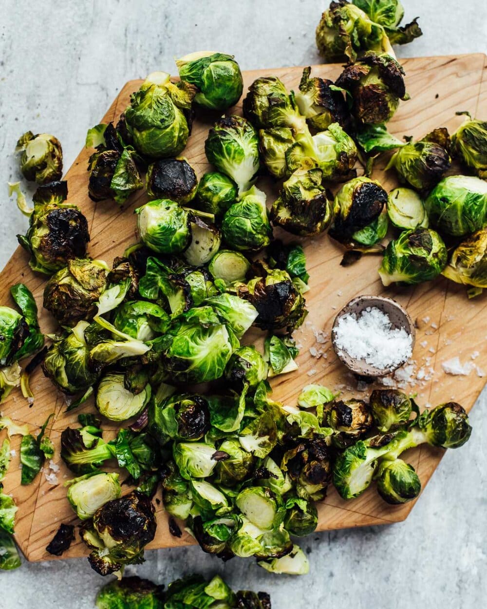 grilled brussels sprouts on a cutting board