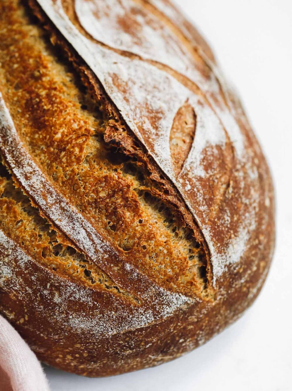 einkorn sourdough bread on white surface