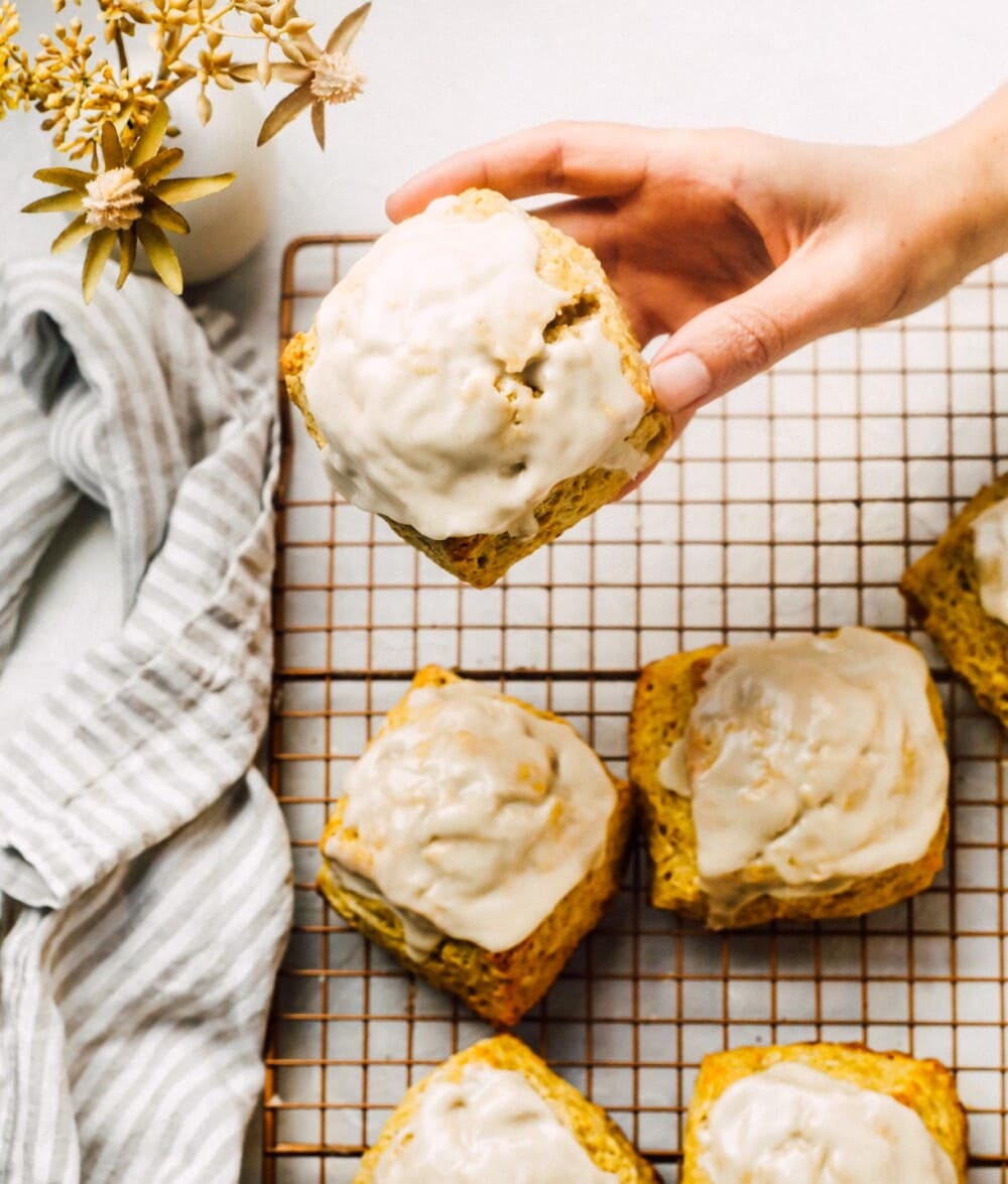 holding sourdough scone in hand