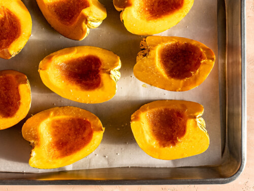 carnival squash wedges on baking sheet