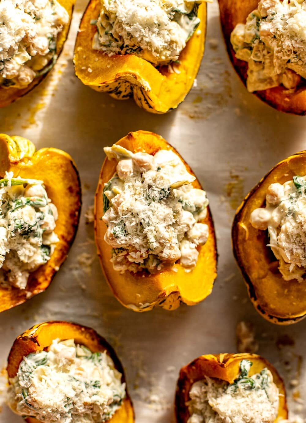 stuffed carnival squash on a sheet pan