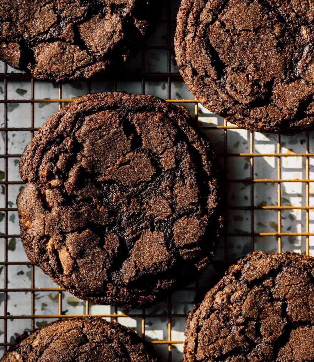gluten free chocolate cookies on a wire cooling rack