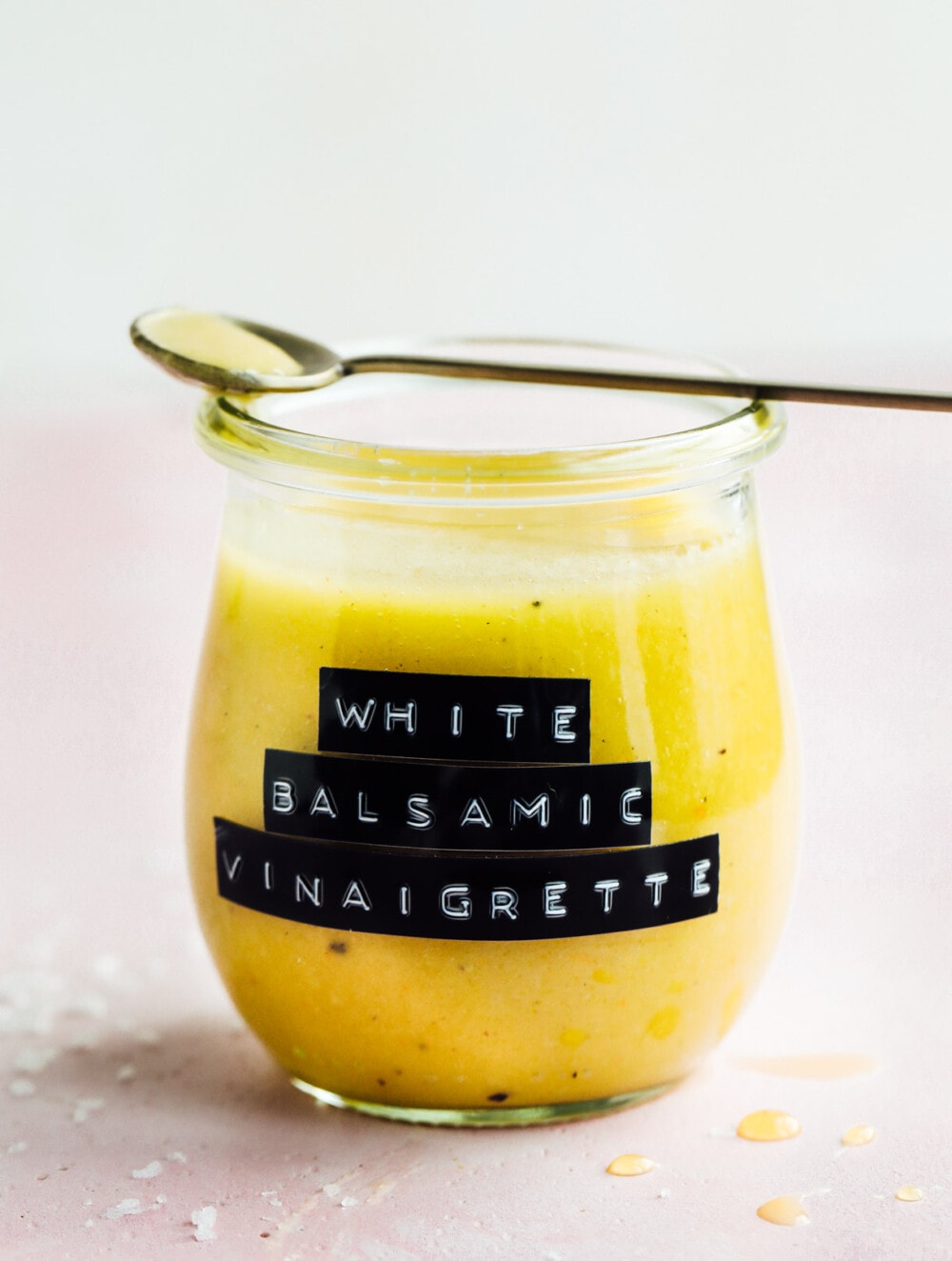 white balsamic vinaigrette in glass jar with label