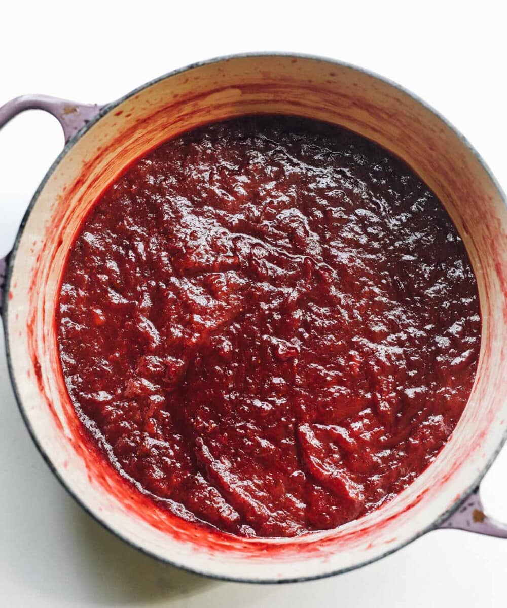 strawberry rhubarb jam cooking in a pot