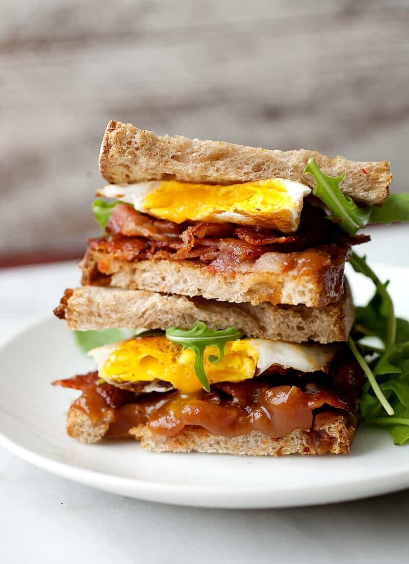 apple butter breakfast sandwich stacked on white plate