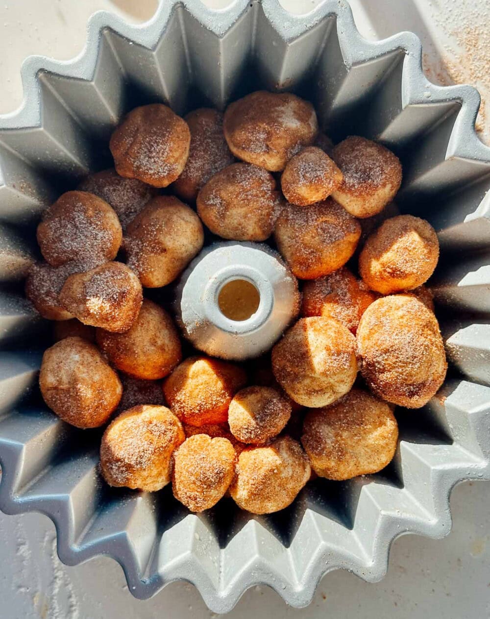 monkey bread before proofing in a bundt pan