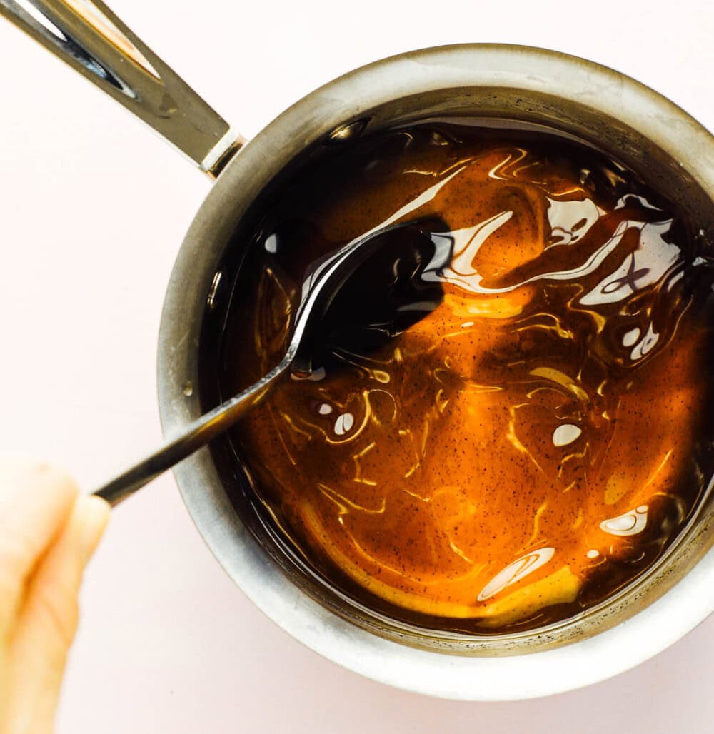 stirring vanilla syrup in a saucepan