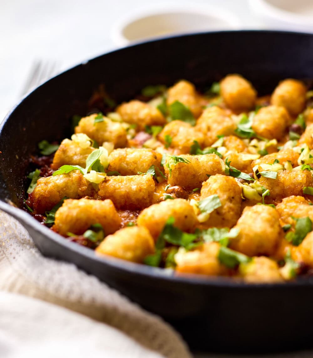 tater tot hotdish in cast iron skillet