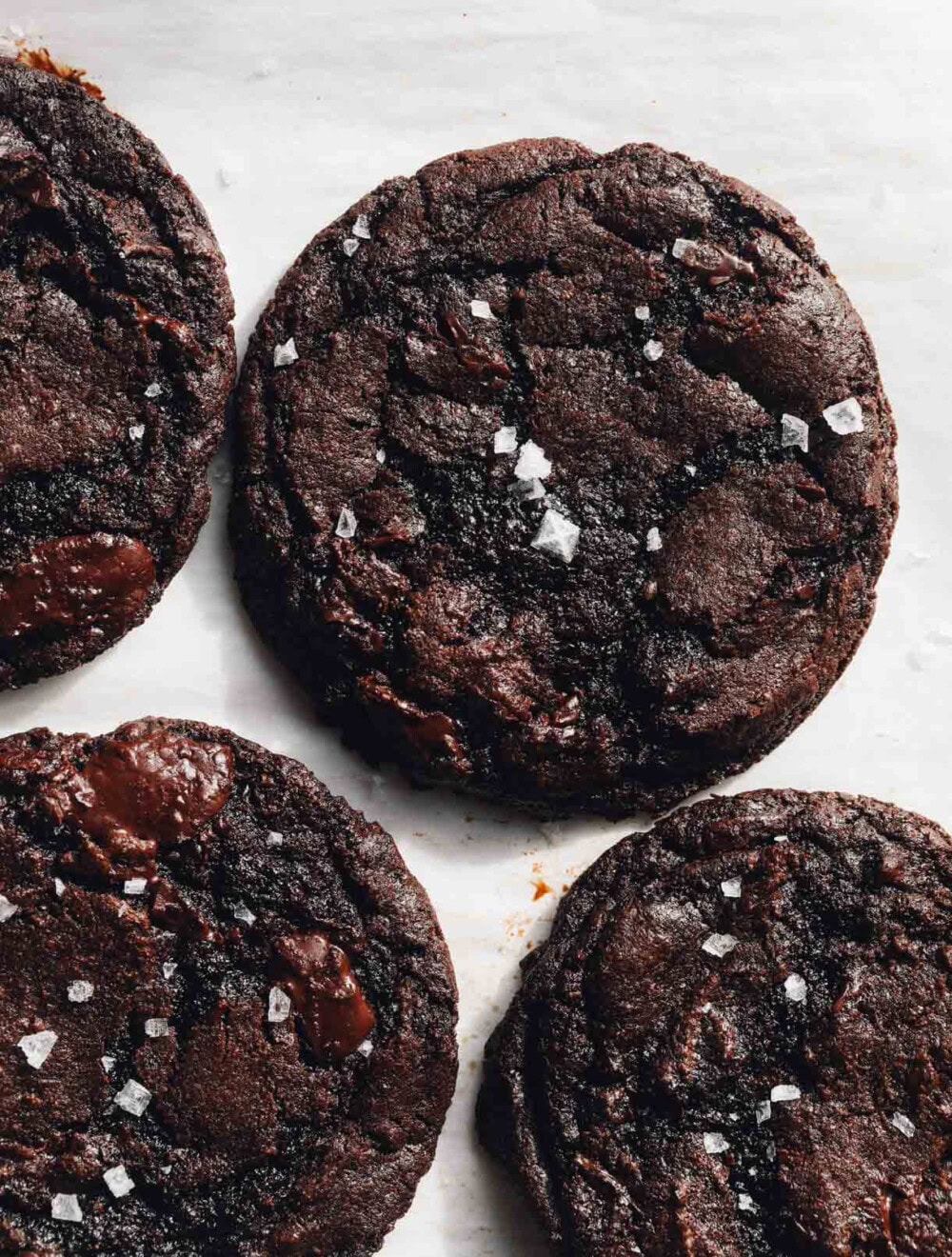 sourdough chocolate cookies on parchment paper